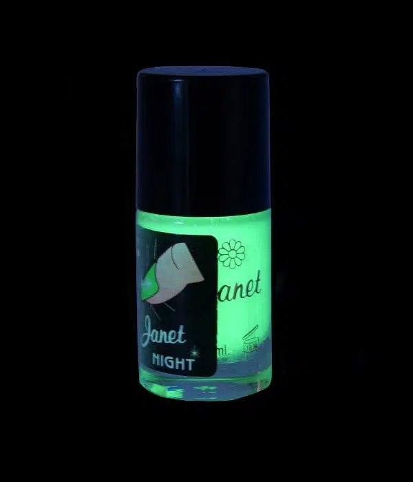 Flacon de vernis phosphorescent qui brille en vert dans le noir